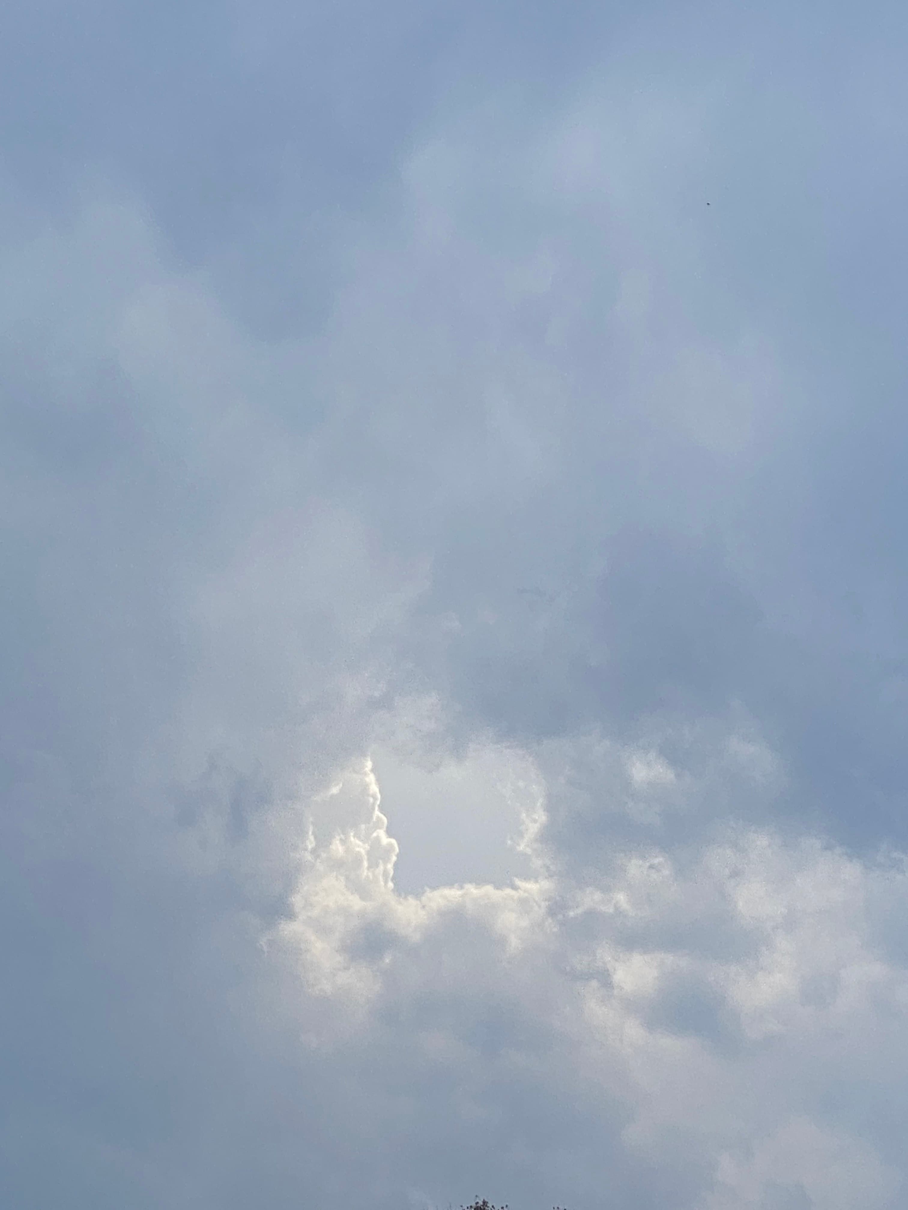 Light breaking through clouds over Austin
